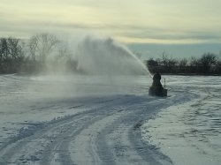 Alan using the snowblower on the driveway